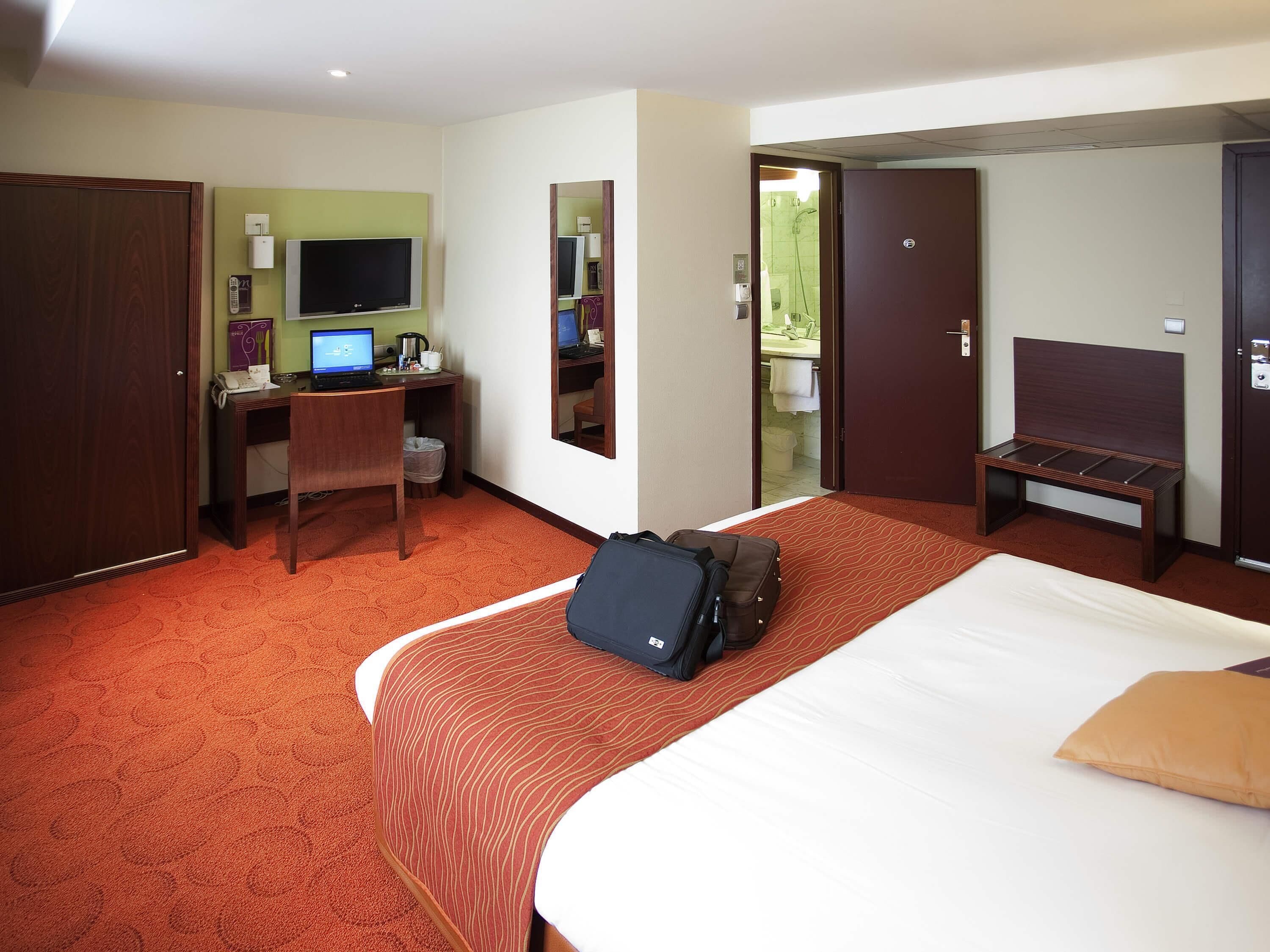 In-room safe, desk, blackout curtains, soundproofing