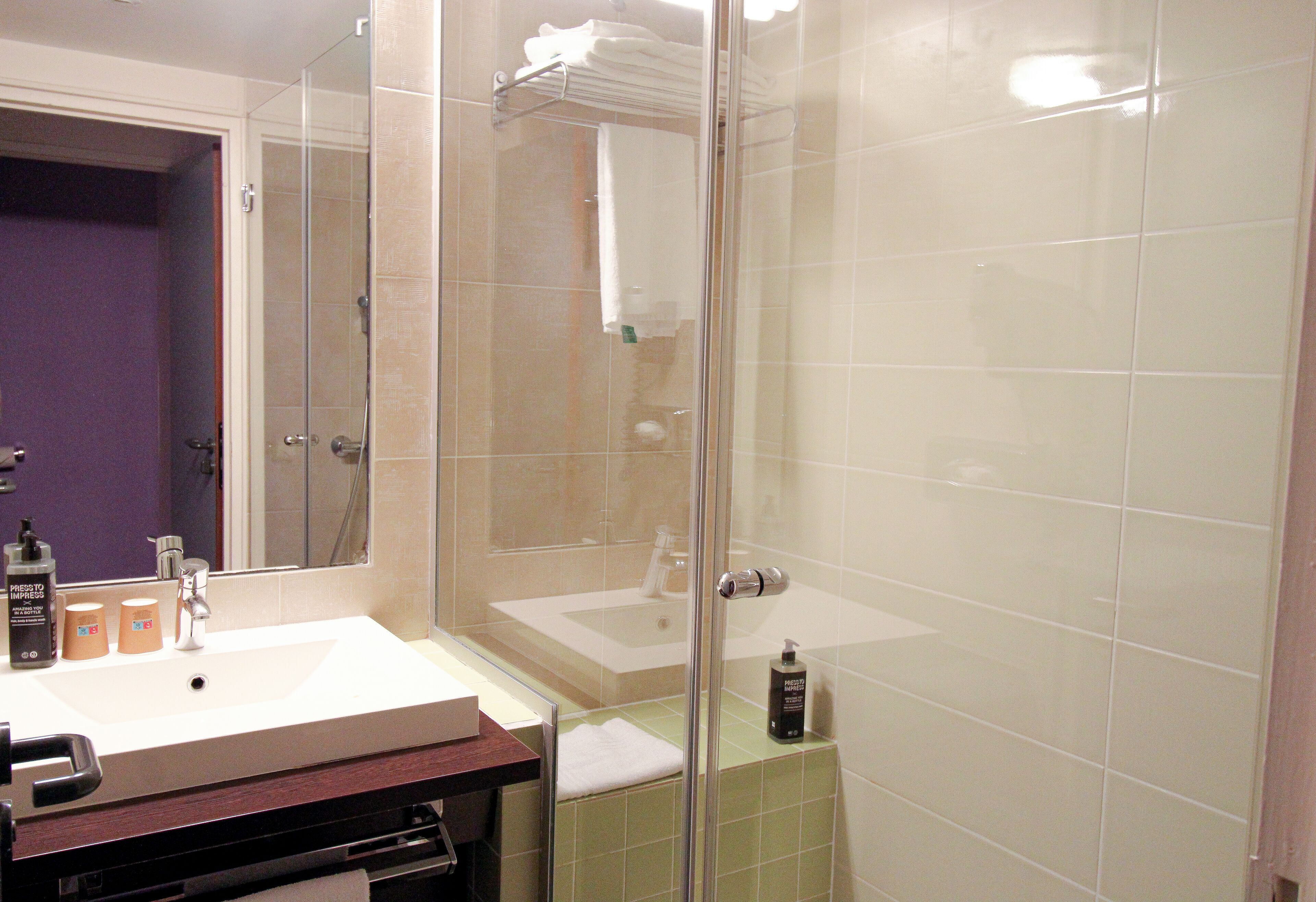 eco-friendly toiletries, hair dryer, towels