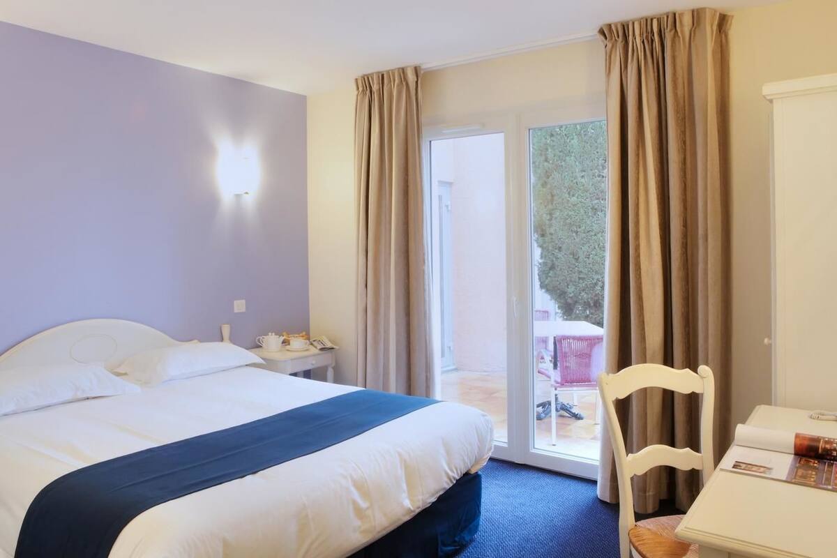 superior room, 1 queen bed, terrace, garden view | premium bedding, in-room safe, desk, blackout curtains