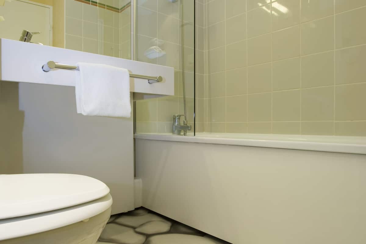 shower, eco-friendly toiletries, hair dryer, towels