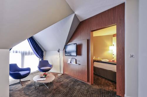 Suite superior, 1 llit de matrimoni gran i sofà llit | Minibar, caixa forta a l'habitació i cortines opaques