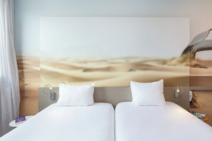 Ropa de cama de alta calidad, colchones con pillow-top y escritorio 