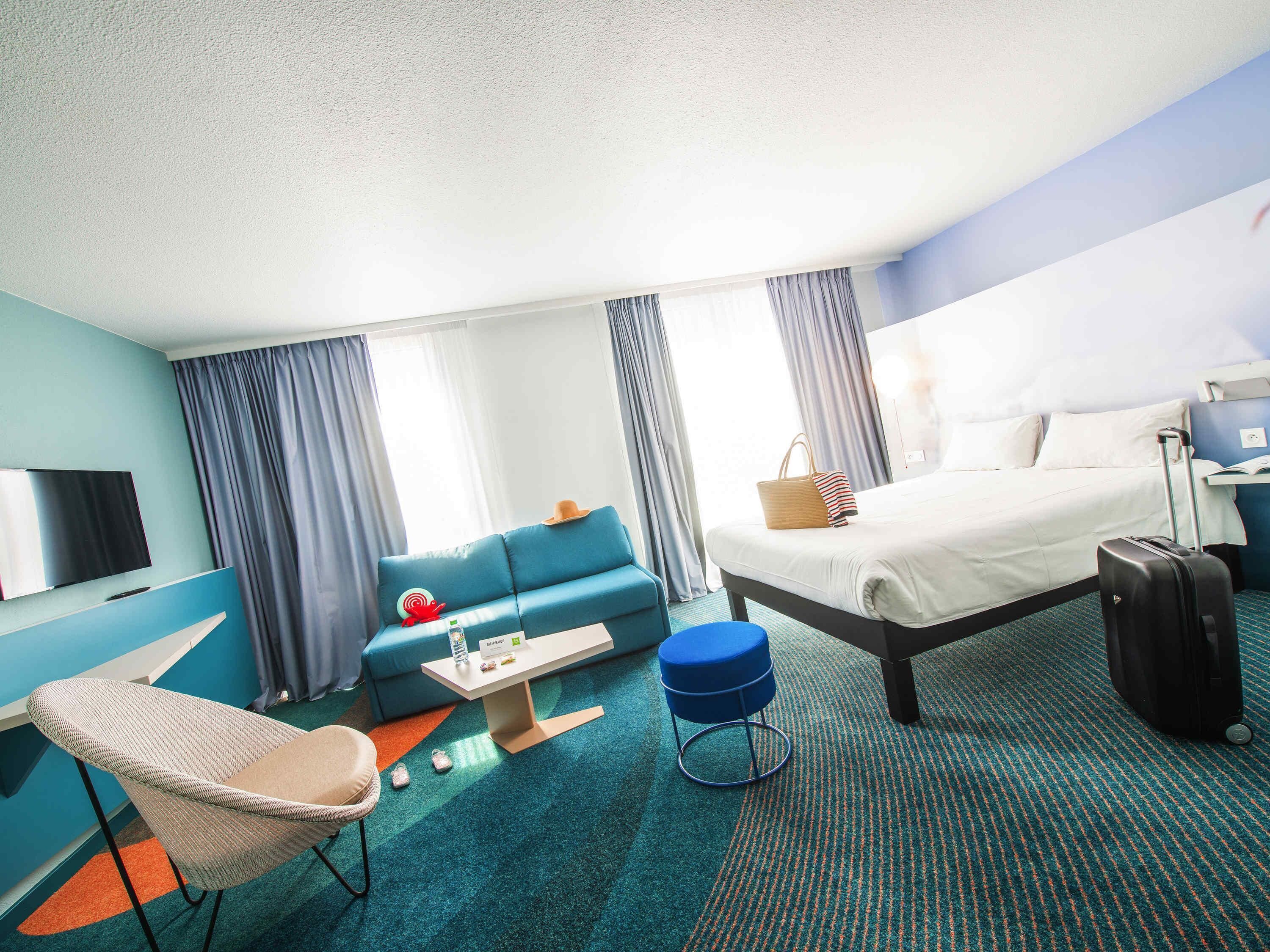 Premium bedding, pillow-top beds, desk, laptop workspace