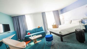 Premium bedding, pillow-top beds, desk, laptop workspace