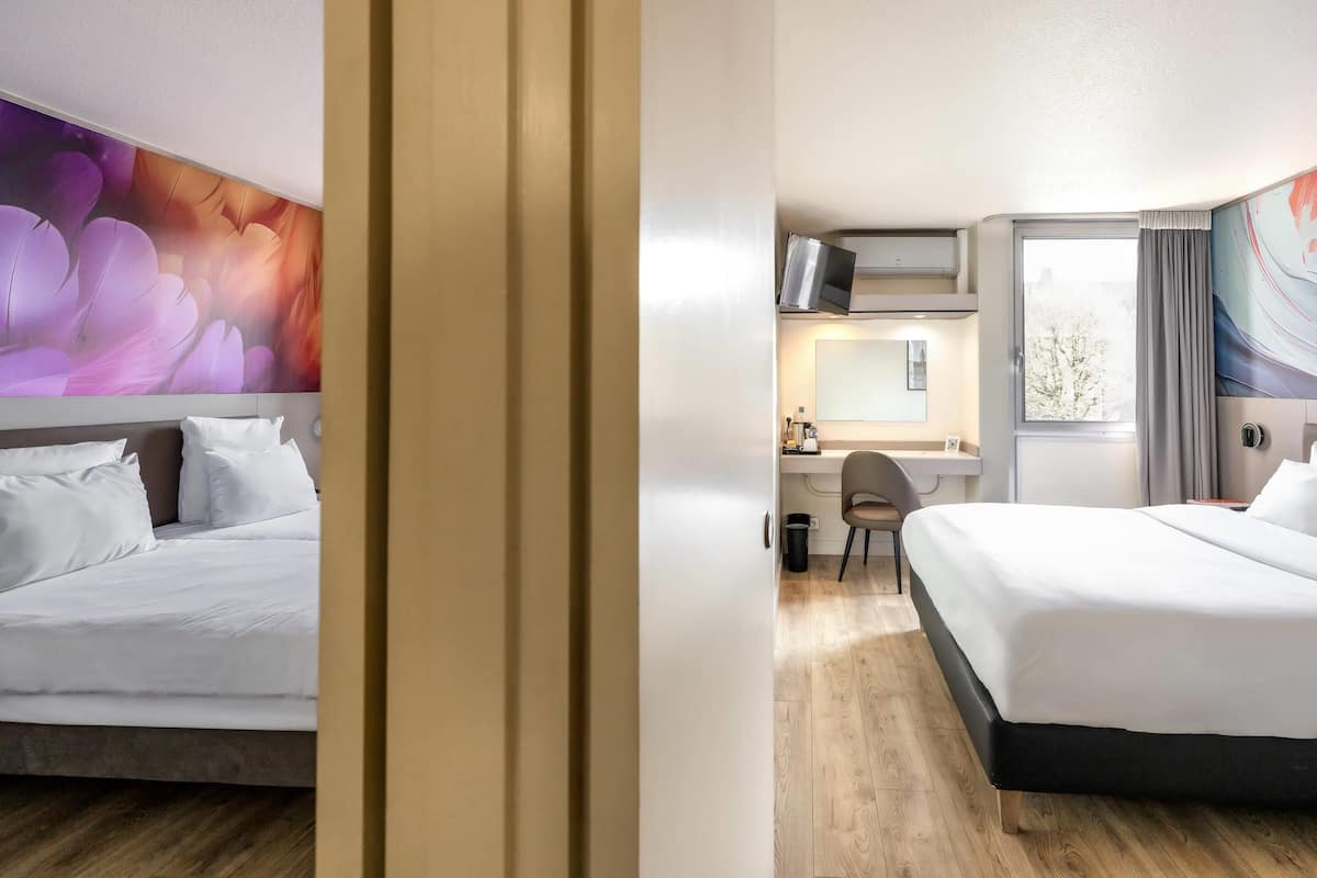 Habitación familiar | Ropa de cama de alta calidad, escritorio y insonorización