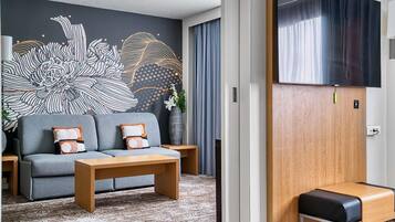 Suite, 1 trÚs grand lit et 1 canapé-lit