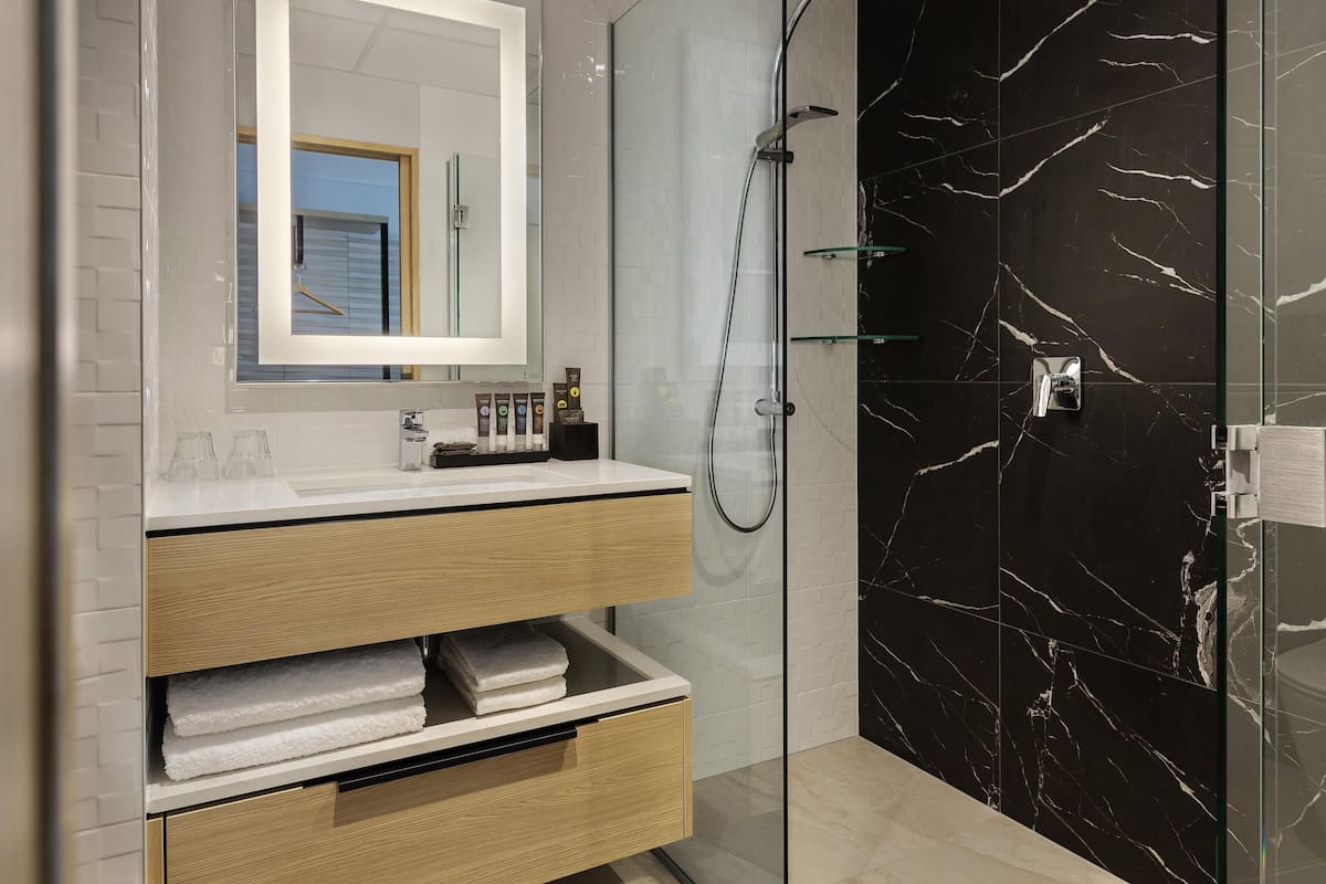 In-room safe, desk, laptop workspace, blackout curtains