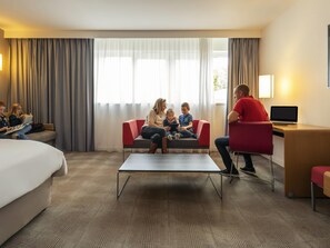Superior Suite, Multiple Beds | Premium bedding, in-room safe, individually furnished, desk