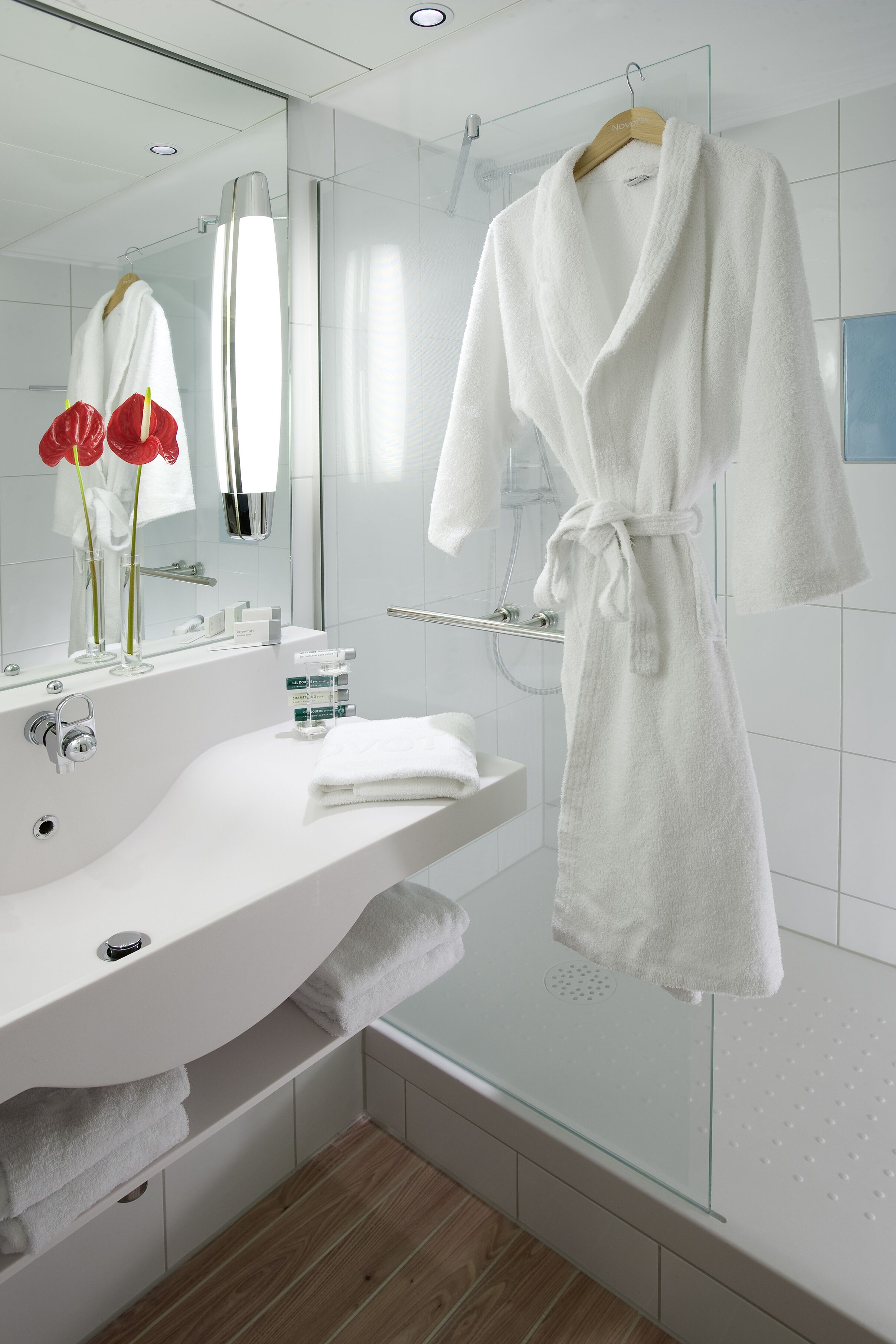 superior suite, multiple beds | bathroom | rainfall showerhead, eco-friendly toiletries, hair dryer, towels