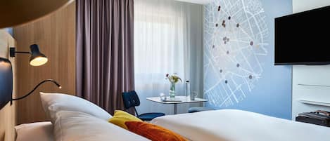 Ropa de cama de alta calidad y minibar