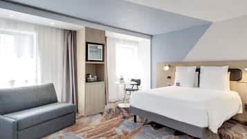 Minibar, coffres-forts dans les chambres, bureau, rideaux occultants