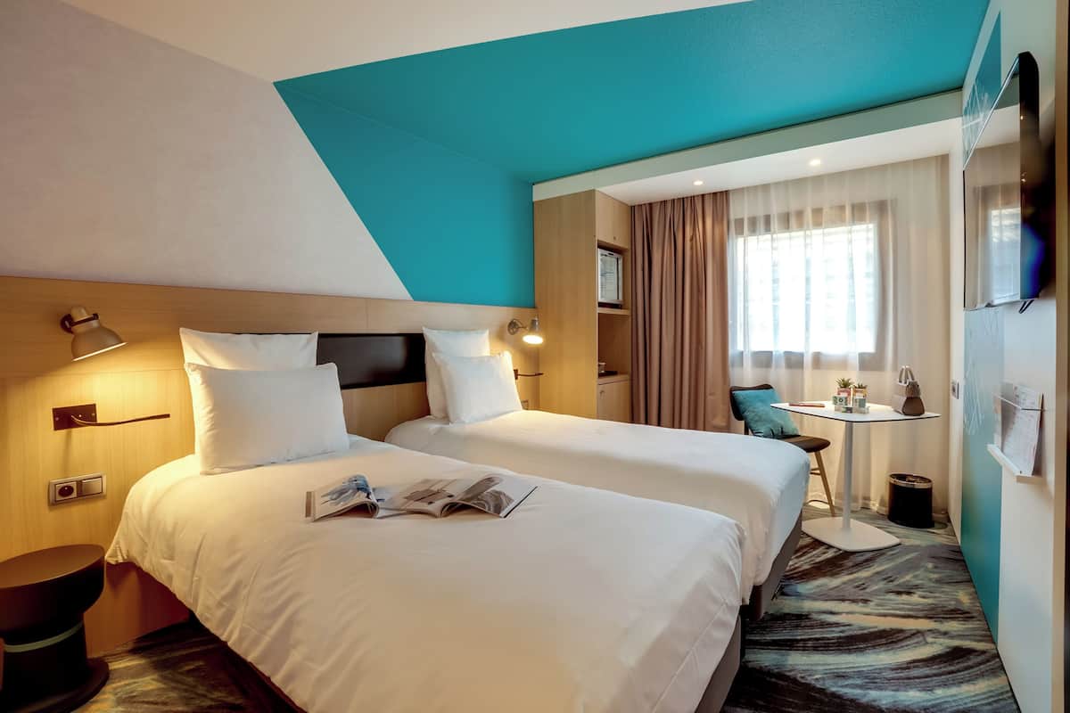 Habitación superior, 2 camas individuales | Ropa de cama de alta calidad y minibar