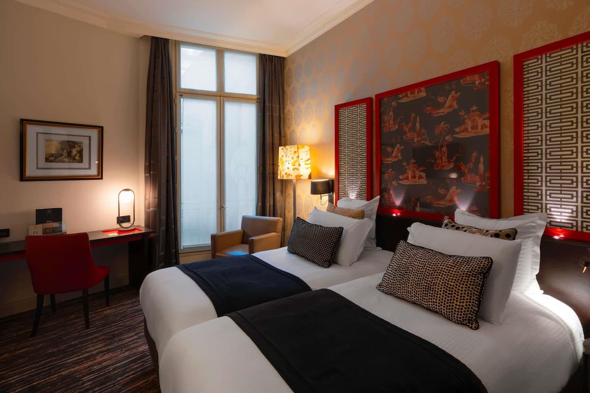 Habitación clásica, 2 camas individuales | Ropa de cama de alta calidad y minibar