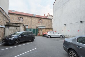 Stroll down this charming street lined with trees and historic buildings.