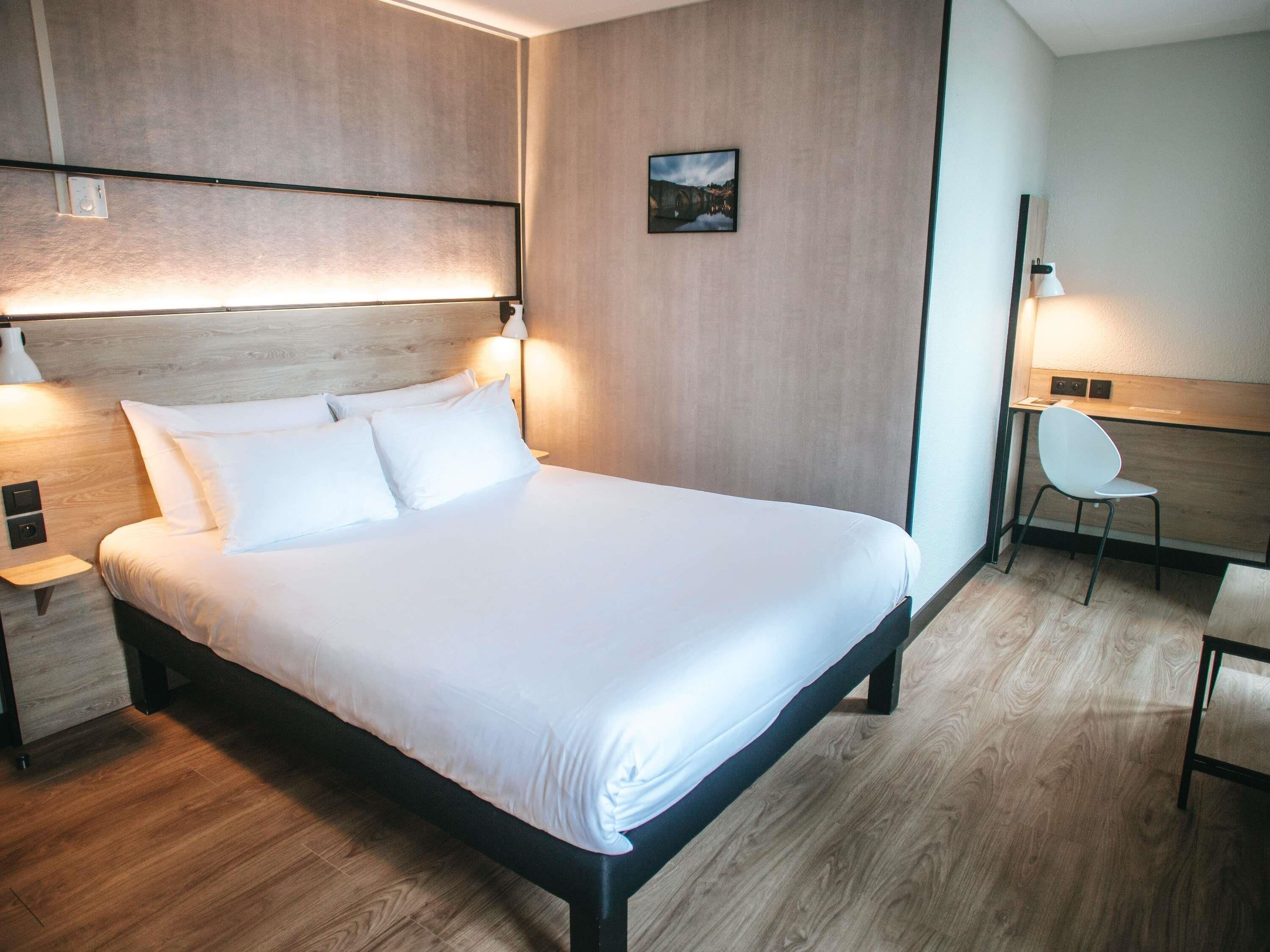 Premium bedding, desk, blackout curtains, soundproofing