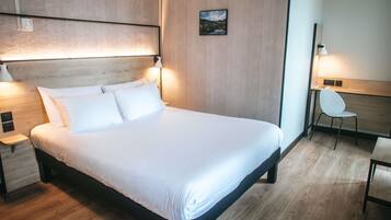 Premium bedding, desk, blackout curtains, soundproofing