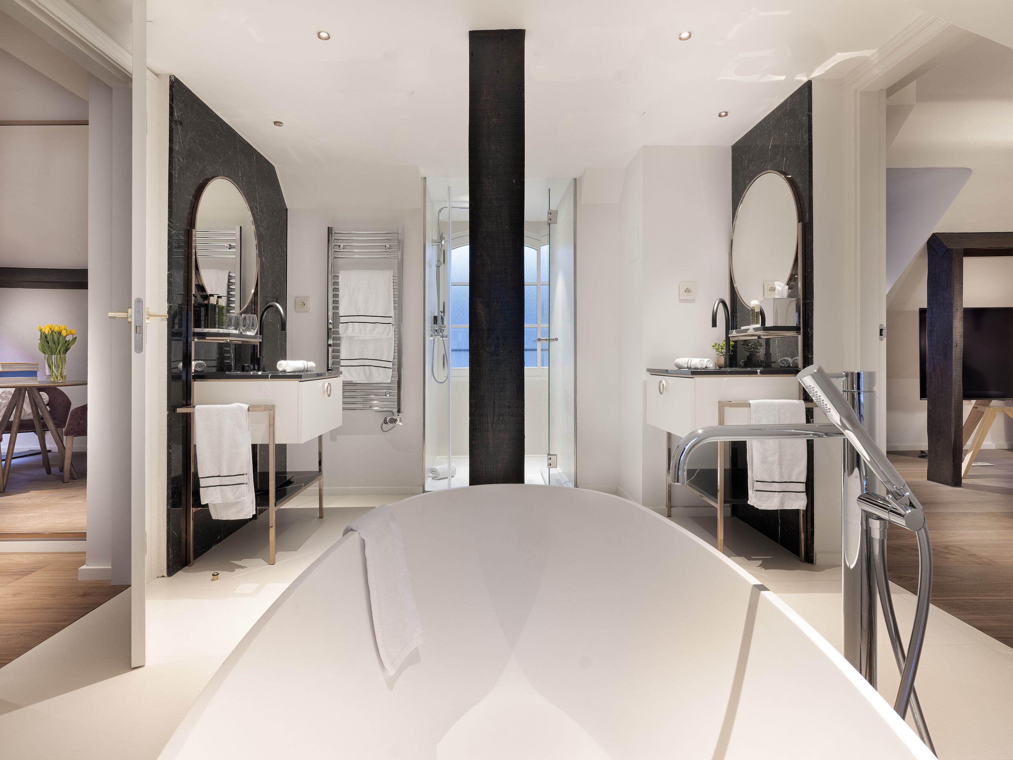 maria sorolla grand suite | bathroom | eco-friendly toiletries, hair dryer, bathrobes, slippers