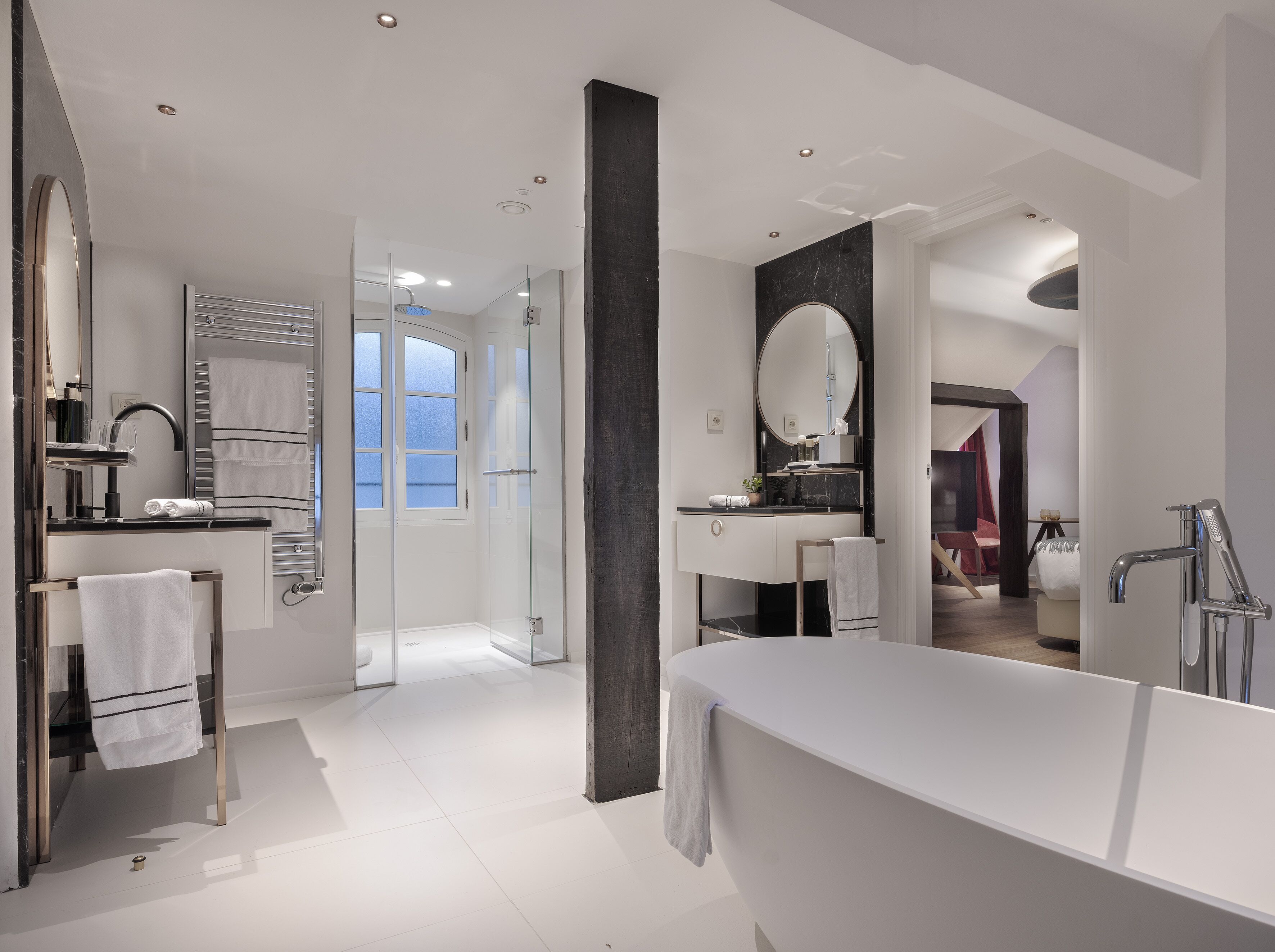 maria sorolla grand suite | bathroom | eco-friendly toiletries, hair dryer, bathrobes, slippers