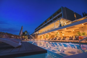 Seasonal outdoor pool, pool umbrellas, pool loungers
