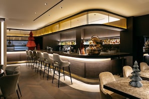 Lobby lounge, poolside views, open daily