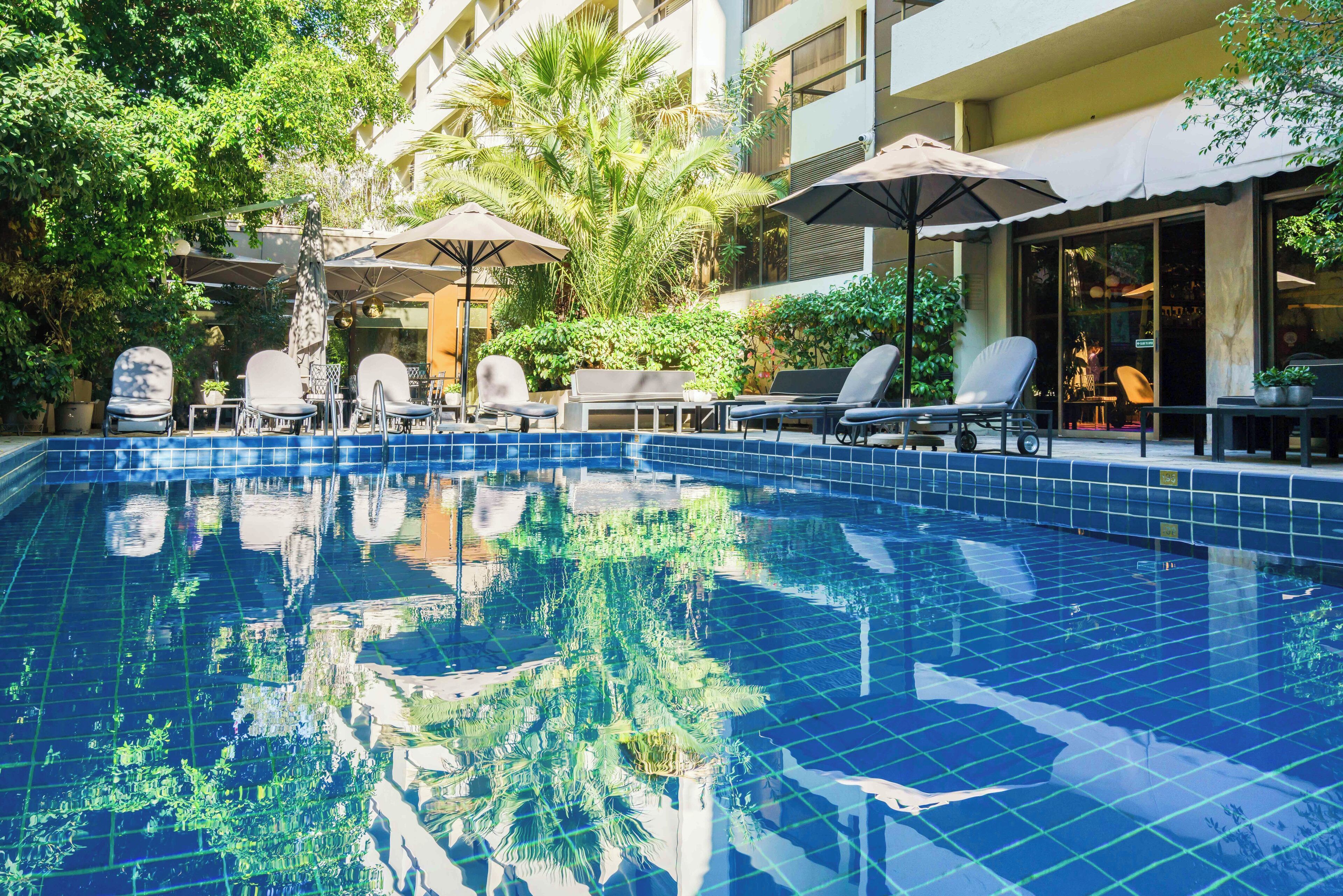 Outdoor pool, open 8:30 AM to 2:30 PM, pool umbrellas, sun loungers