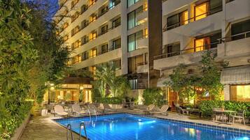 Outdoor pool, open 8:30 AM to 2:30 PM, pool umbrellas, sun loungers