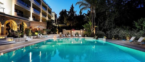 Seasonal outdoor pool, pool umbrellas, pool loungers