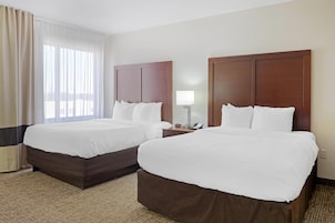 Suite, 2 Queen Beds, Non Smoking | Desk, blackout drapes, iron/ironing board, cribs (free)