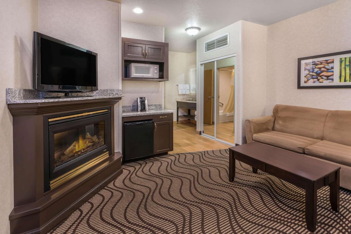 premium bedding, desk, laptop workspace, blackout curtains