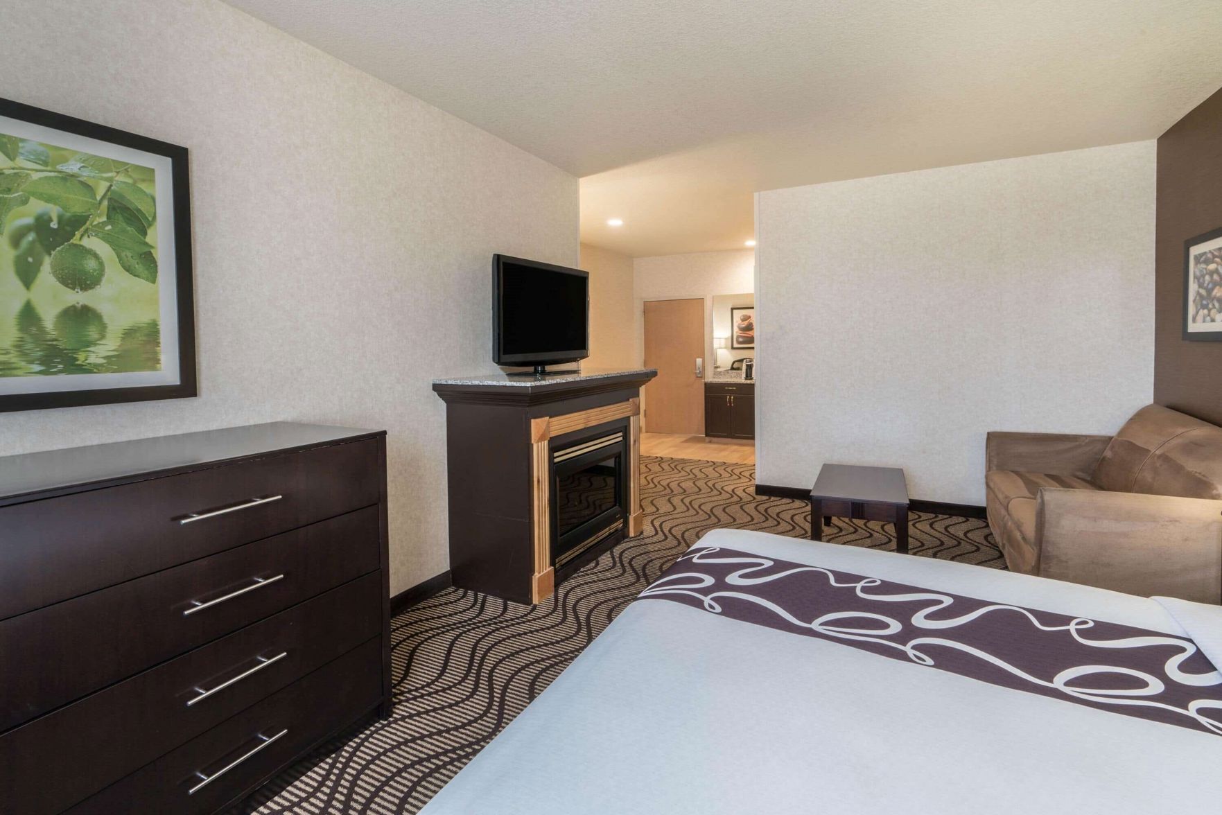 Premium bedding, desk, laptop workspace, blackout drapes