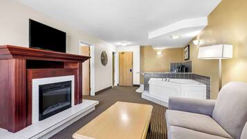 Suite, 1 cama King size, para no fumadores, hidromasaje (Separate Living Room) | Escritorio, espacio para trabajar con laptop y cortinas blackout