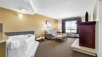 Desk, laptop workspace, blackout drapes, iron/ironing board