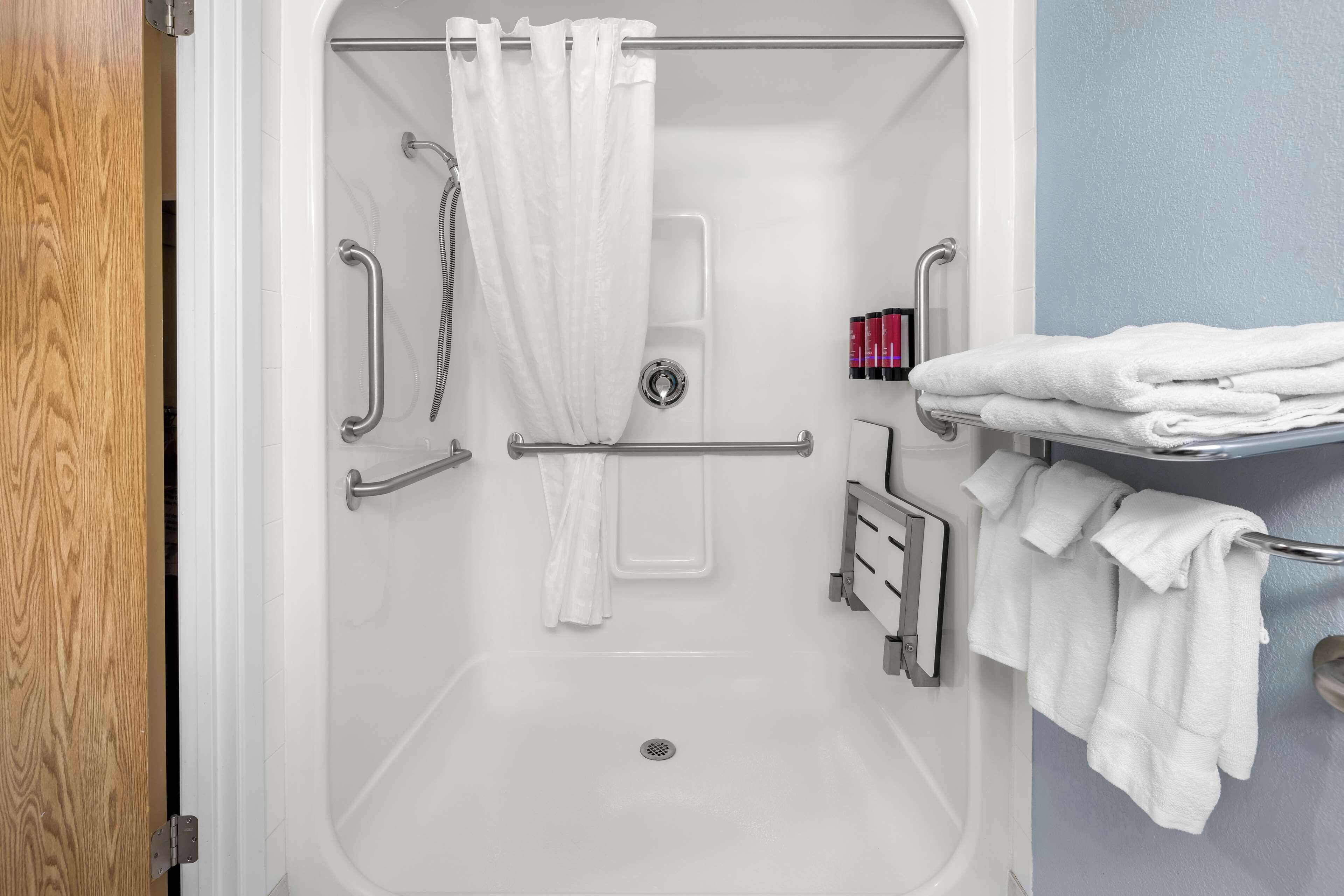 combined shower/bathtub, free toiletries, hair dryer, towels