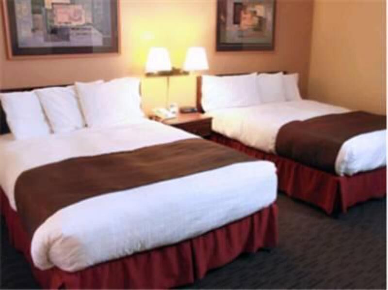Premium bedding, pillow-top beds, desk, laptop workspace