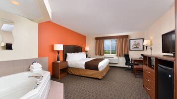 Phòng Suite Deluxe, 1 phòng ngủ, không hút thuốc, bồn tắm thủy lực (1 King) | Bộ đồ giường cao cấp, nệm có lớp đệm bông, bàn