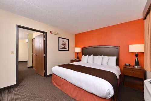 Premium bedding, pillow-top beds, desk, laptop workspace