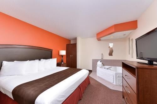 Premium bedding, pillow-top beds, desk, laptop workspace
