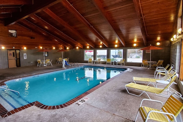Indoor pool, open 7 AM to midnight, pool loungers
