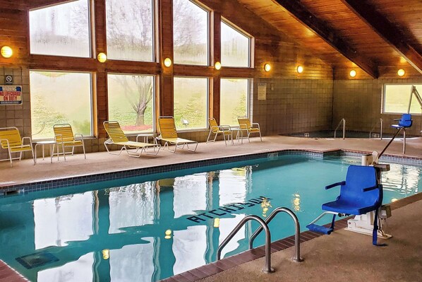 Indoor pool, open 7 AM to midnight, pool loungers