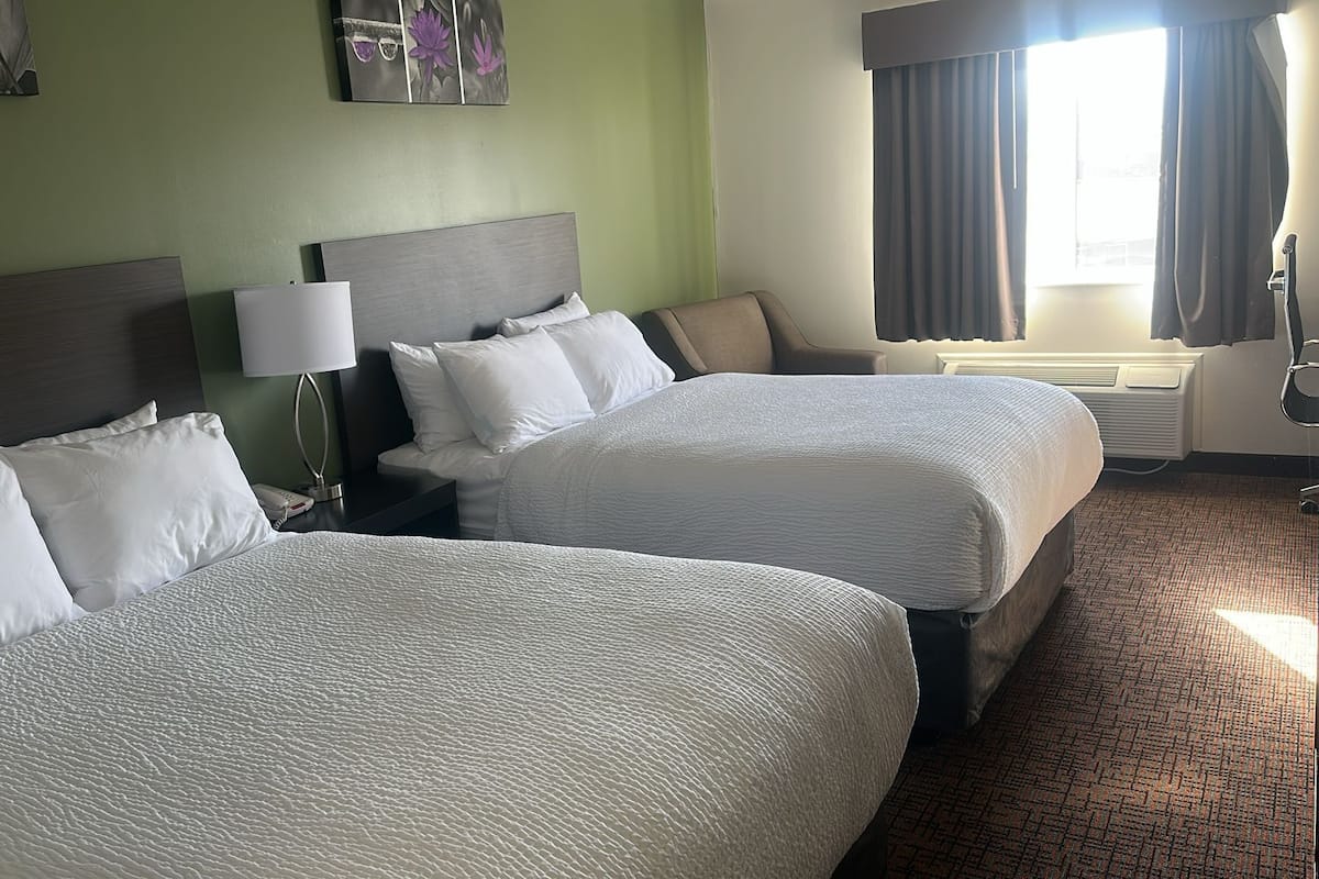 Room, 2 Queen Beds, Non Smoking | In-room safe, blackout drapes, iron/ironing board