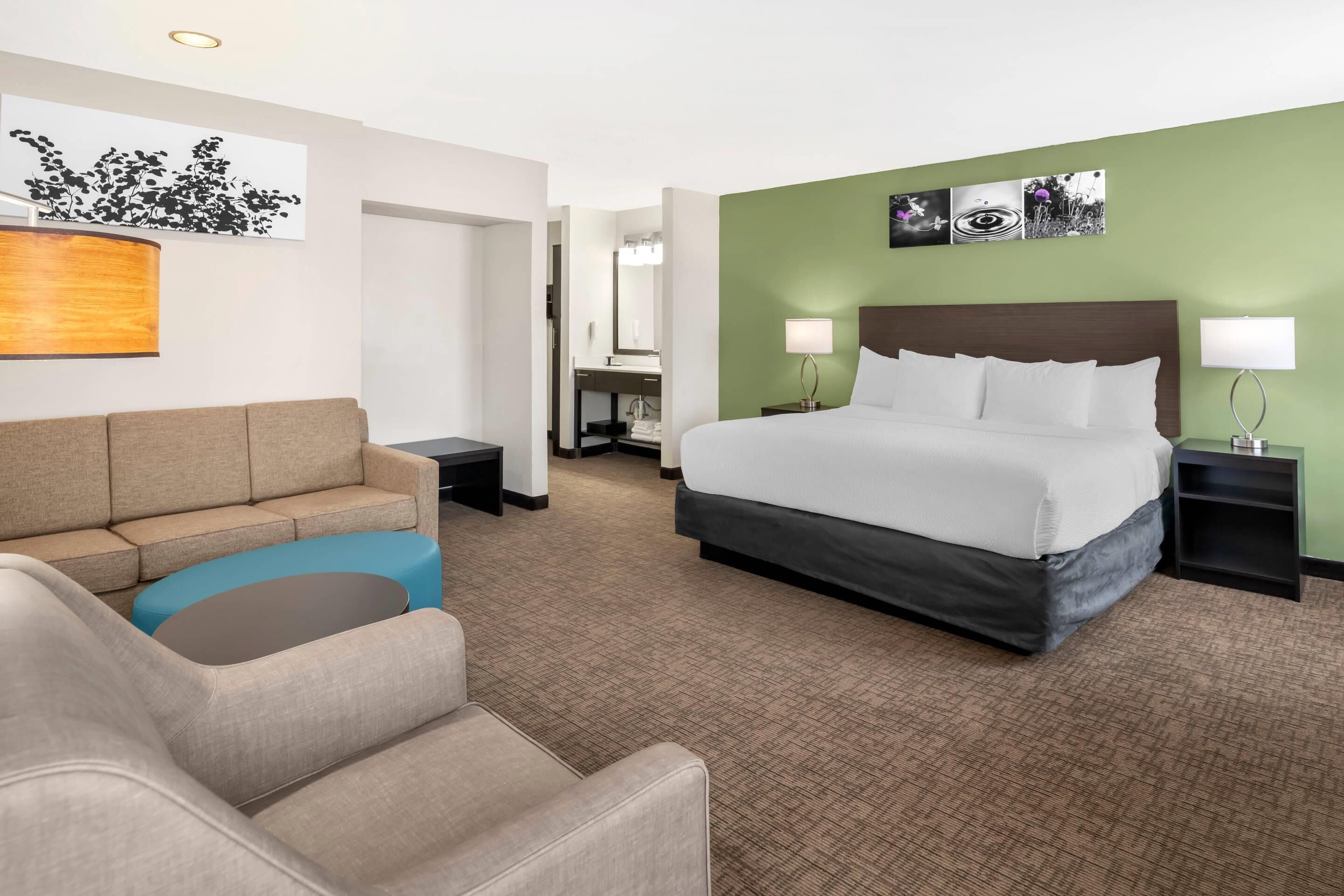 Suite, 1 King Bed, Non Smoking | In-room safe, blackout curtains, iron/ironing board