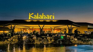 A hotel named 'Kalahari' with a covered outdoor area, a pool, and a waterfall feature. - Comfort Inn Norwalk - Sandusky (Norwalk)