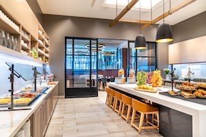 Daily buffet breakfast (USD 26.95 per person)