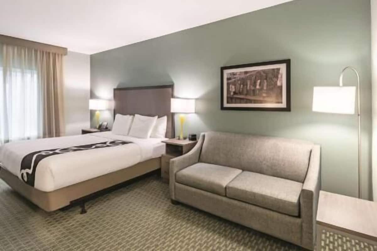 Premium bedding, laptop workspace, blackout drapes, iron/ironing board