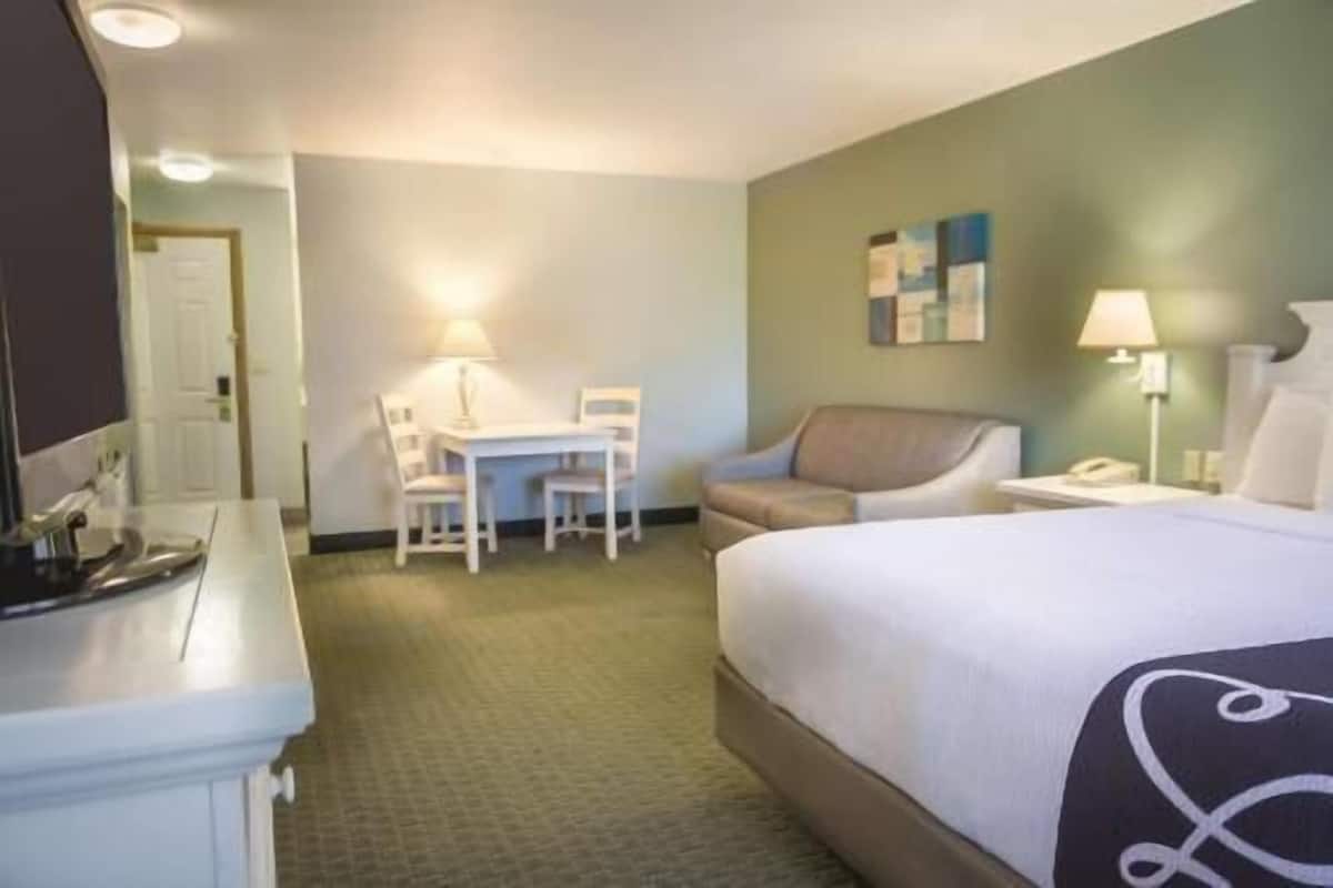 Premium bedding, laptop workspace, blackout drapes, iron/ironing board