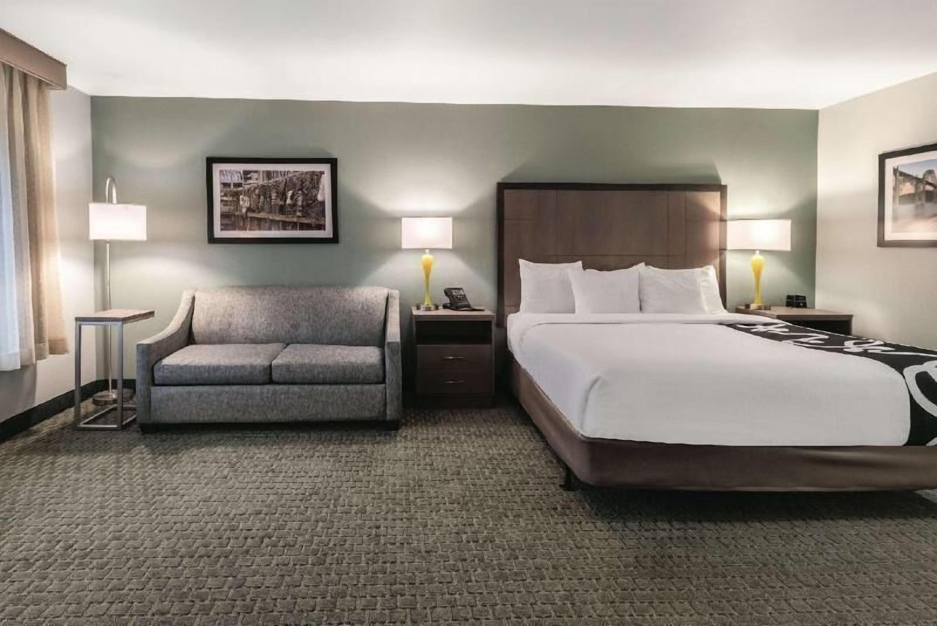 Premium bedding, laptop workspace, blackout drapes, iron/ironing board