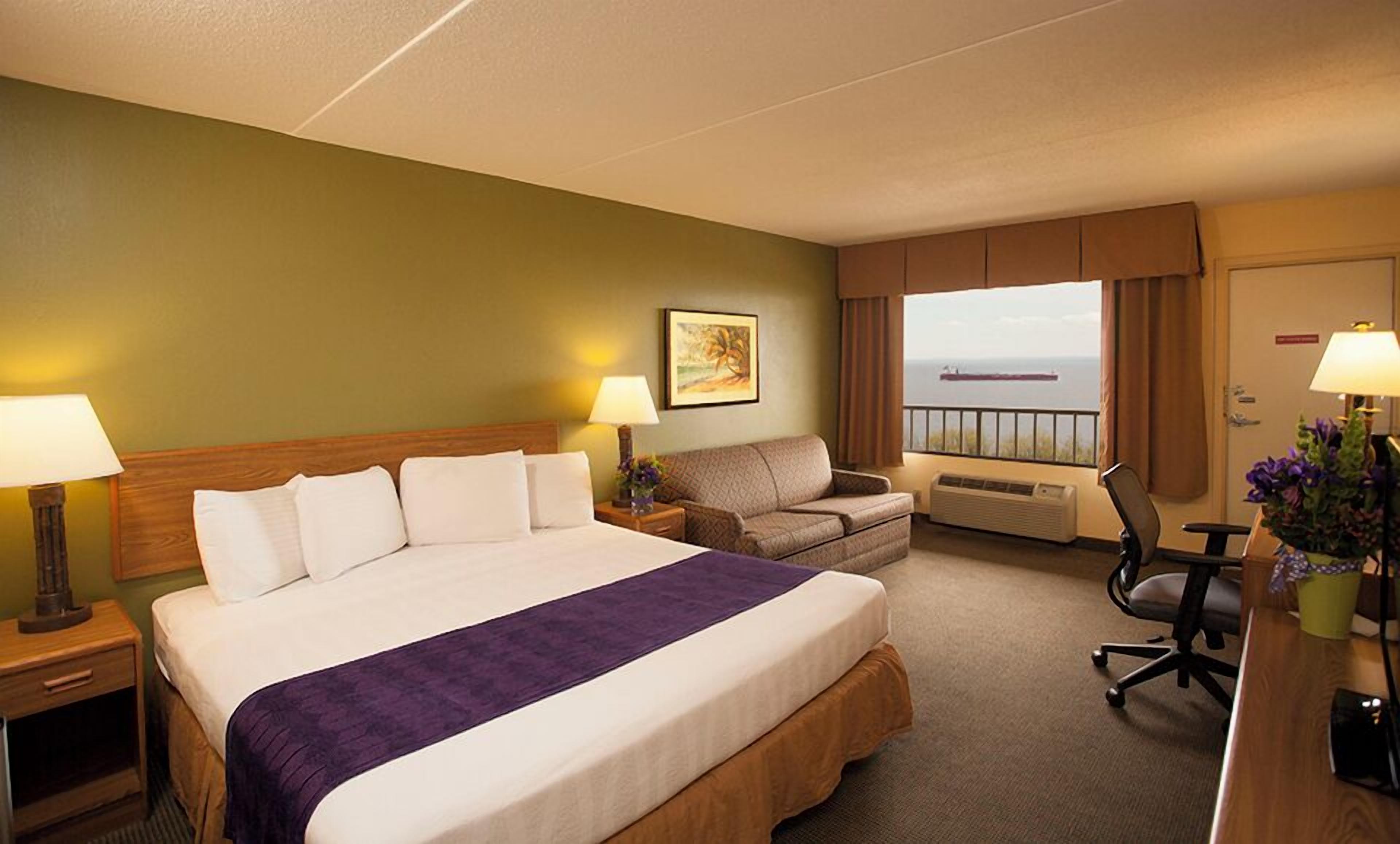 Premium Room, 1 King Bed with Sofa bed, Balcony, Lake View | Desk, laptop workspace, blackout drapes, iron/ironing board