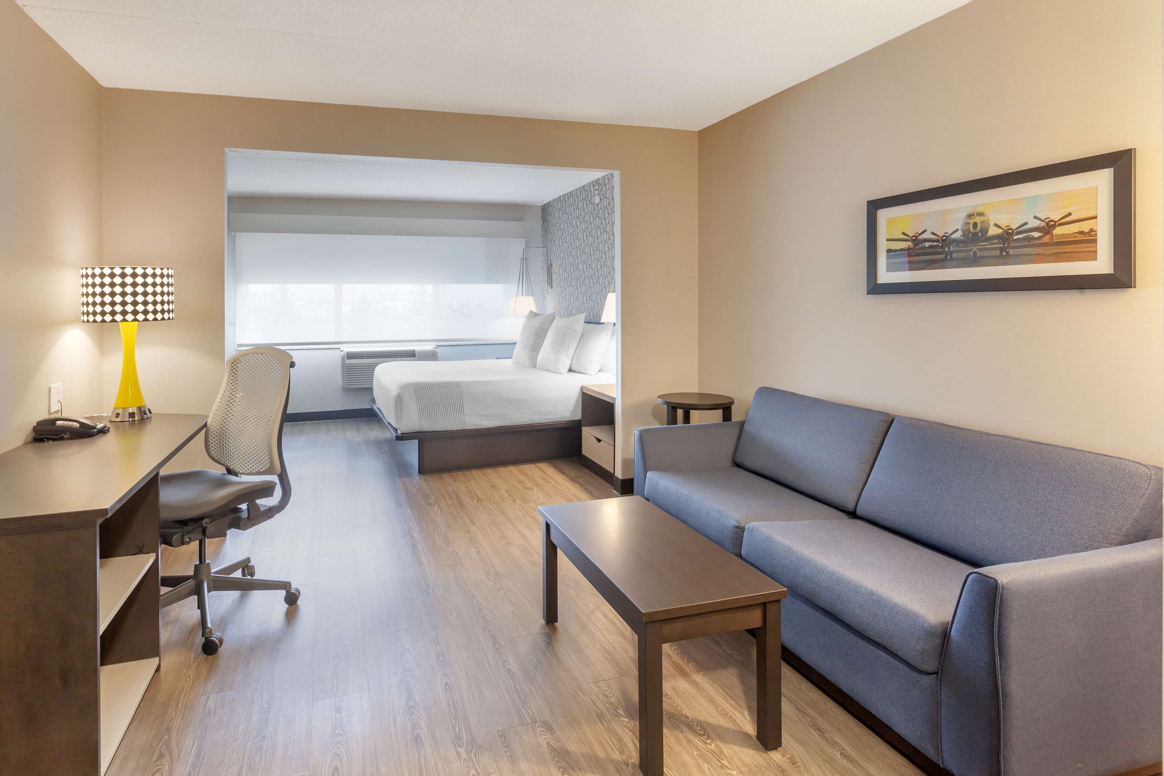 suite, 1 king bed, non smoking, kitchenette (walk-in shower;with sofabed) | living area | 50-inch tv with cable channels, netflix, streaming services