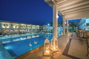 Breakfast, lunch, dinner served; international cuisine, pool views