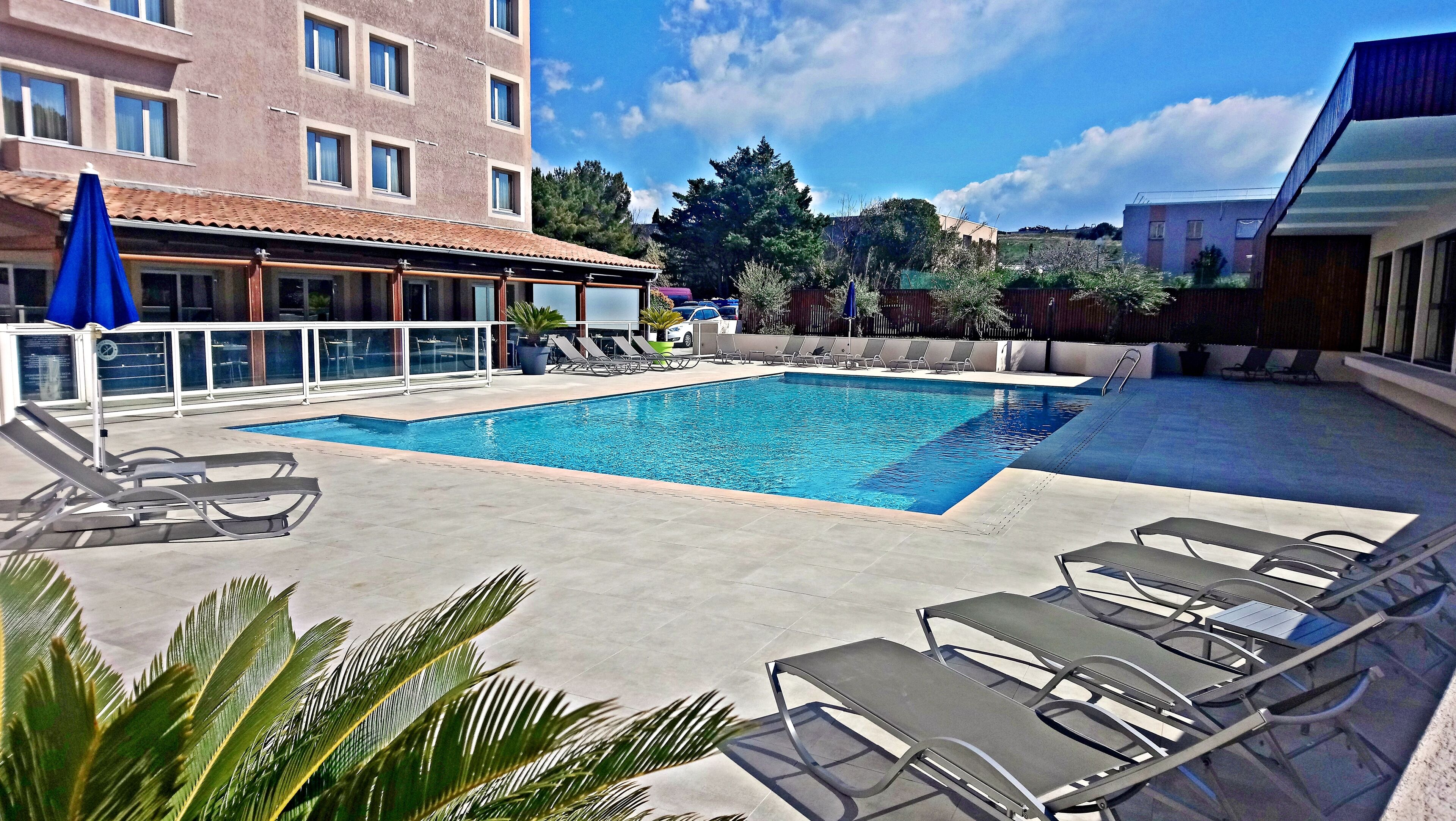 Outdoor pool, open 6:30 AM to 10:30 PM, sun loungers
